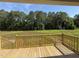 View of the wooded area from the back deck overlooking nature at 171 Tulipfield Way, Benson, NC 27504