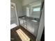 Bathroom featuring dual sinks with granite countertops, providing ample space at 171 Tulipfield Way, Benson, NC 27504