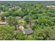 Aerial view of a home surrounded by lush trees at 1717 Martin Luther King Jr Blvd, Raleigh, NC 27610