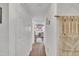 Inviting hallway with a view of the living area and ample closet space for convenient storage at 1717 Martin Luther King Jr Blvd, Raleigh, NC 27610