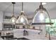 Stylish kitchen features pendant lighting and modern appliances at 1717 Martin Luther King Jr Blvd, Raleigh, NC 27610