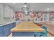 Updated kitchen showcasing a large island with seating, storage, and eat-in space at 1717 Martin Luther King Jr Blvd, Raleigh, NC 27610
