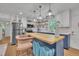 Bright kitchen with a center island, stainless steel appliances, and eye-catching decor at 1717 Martin Luther King Jr Blvd, Raleigh, NC 27610