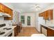 Cozy kitchen with natural light and lots of storage space at 1720 Kingston Heath Way, Raleigh, NC 27604