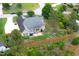 Charming single Gathering home with a spacious backyard, wooden fence, and a cozy patio area at 182 Brendamoore Ct, Fuquay Varina, NC 27526