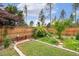 Secluded backyard area featuring a bench, stone pathway, and lots of green plants at 182 Brendamoore Ct, Fuquay Varina, NC 27526