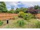 Fenced backyard featuring a garden, bird bath, and plenty of space to enjoy the outdoors at 182 Brendamoore Ct, Fuquay Varina, NC 27526
