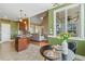 A bright breakfast nook that connects the kitchen and living room at 182 Brendamoore Ct, Fuquay Varina, NC 27526