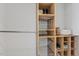 A well-organized closet featuring adjustable shelving and chrome storage baskets at 182 Brendamoore Ct, Fuquay Varina, NC 27526