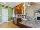 Kitchen area with wood cabinets and stainless steel appliances at 182 Brendamoore Ct, Fuquay Varina, NC 27526