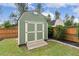 Backyard shed with double doors, offering ample storage space and convenience at 182 Brendamoore Ct, Fuquay Varina, NC 27526