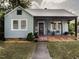 Charming single-story home featuring a covered front porch and well-maintained lawn at 200 S Pettigrew St, Raleigh, NC 27610