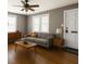 Comfortable living room with natural light, sleek furniture, and hardwood floors at 200 S Pettigrew St, Raleigh, NC 27610