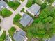 Bird's eye view of a suburban neighborhood showcasing well-maintained homes and green spaces at 2003 Red Sage Ct, Apex, NC 27502
