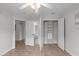 Bedroom featuring a closet, ceiling fan and a view into additional rooms at 2003 Red Sage Ct, Apex, NC 27502