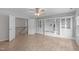 Bonus room featuring built-in shelving and a ceiling fan at 2003 Red Sage Ct, Apex, NC 27502