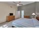 Bright bedroom with vaulted ceilings, carpet floors, two windows and ample closet space at 203 N Becket St, Cary, NC 27513