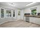 Bright kitchen with white cabinets and stainless steel appliances at 2213 Stephanie Ln, Clayton, NC 27520
