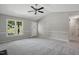 Cozy living room with neutral tones and lots of natural light at 2213 Stephanie Ln, Clayton, NC 27520