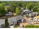 Aerial view of modern homes surrounded by lush greenery and a quiet street at 2321 Turners Aly, Raleigh, NC 27607