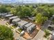 Stunning aerial view of modern homes, showcasing their sleek design and the lush green neighborhood in an urban setting at 2321 Turners Aly, Raleigh, NC 27607