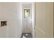 Bathroom featuring a small window that lets in natural light and gray tile flooring at 2321 Turners Aly, Raleigh, NC 27607