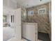 Modern bathroom featuring decorative tile shower with black tile flooring and natural lighting at 2321 Turners Aly, Raleigh, NC 27607