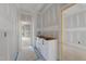 Bathroom featuring an unfinished vanity and an open doorway at 2321 Turners Aly, Raleigh, NC 27607