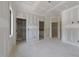 Unfinished bedroom with closet and doorway access and natural lighting from a window at 2321 Turners Aly, Raleigh, NC 27607