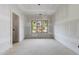 Unfinished bedroom featuring a large window at 2321 Turners Aly, Raleigh, NC 27607