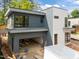 New construction featuring two-car garage and modern design with gray and white siding at 2321 Turners Aly, Raleigh, NC 27607