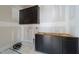 Laundry room featuring unfinished cabinets and a spacious interior at 2321 Turners Aly, Raleigh, NC 27607