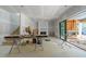 Unfinished open living room featuring a fireplace and a large sliding door at 2321 Turners Aly, Raleigh, NC 27607