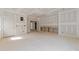 Unfinished living room with multiple entryways and built in shelving at 2321 Turners Aly, Raleigh, NC 27607