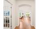 Bright and airy hallway leading to the living and dining areas at 2404 Azalea Dr, Durham, NC 27703
