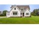Charming two-story home with a well-manicured lawn and inviting front entrance at 2617 Packhouse Rd, Zebulon, NC 27597