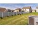 Expansive fenced-in backyard with lush lawn and well-maintained landscaping at 304 Anaconda Trl, Mebane, NC 27302