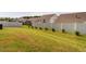 Sprawling fenced-in backyard with lush grass and tidy shrubbery at 304 Anaconda Trl, Mebane, NC 27302