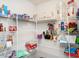 Spacious walk-in pantry with metal shelving and ample storage space for food and household items at 304 Anaconda Trl, Mebane, NC 27302