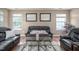 Cozy living room featuring comfortable seating and ample natural light at 313 Weeping Willow Dr, Durham, NC 27704