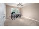 Home office with a large window, desk, two chairs, and plenty of room at 313 Weeping Willow Dr, Durham, NC 27704