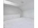 Bright, neutral carpeted bonus room features skylight and ready for your personal design at 3347 Ridgecrest Ct, Raleigh, NC 27607