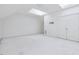 Bright bonus room with skylights, spacious closet, and neutral carpet is ready for your personal touch at 3347 Ridgecrest Ct, Raleigh, NC 27607