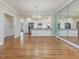 Open concept kitchen with granite countertops, stainless steel appliances, and hardwood floors at 3347 Ridgecrest Ct, Raleigh, NC 27607