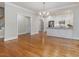 Cozy living room with hardwood floors open to kitchen at 3347 Ridgecrest Ct, Raleigh, NC 27607