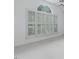 Bright room featuring a large window with shutters allowing natural light at 3347 Ridgecrest Ct, Raleigh, NC 27607