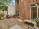 Private deck with seating and access to the brick house and landscaped yard providing a perfect outdoor living space at 3347 Ridgecrest Ct, Raleigh, NC 27607