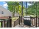 Inviting backyard with grill and storage shed, ideal for outdoor cooking and relaxation at 3541 E Jameson Rd, Raleigh, NC 27604