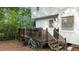Charming back deck area with access to the house and steps down to the yard at 3541 E Jameson Rd, Raleigh, NC 27604