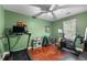 Dedicated fitness room with treadmill, stationary bike, and weight rack for staying active at 3541 E Jameson Rd, Raleigh, NC 27604